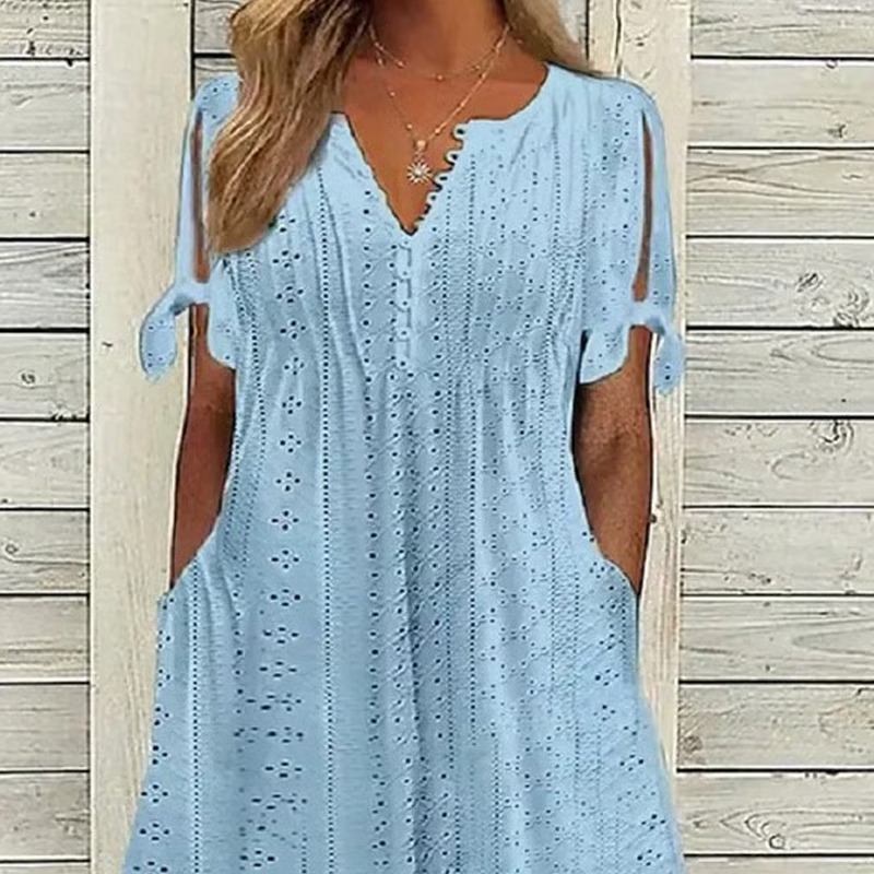 Odette – Vestido midi broderie con cuello en V y mangas anudadas