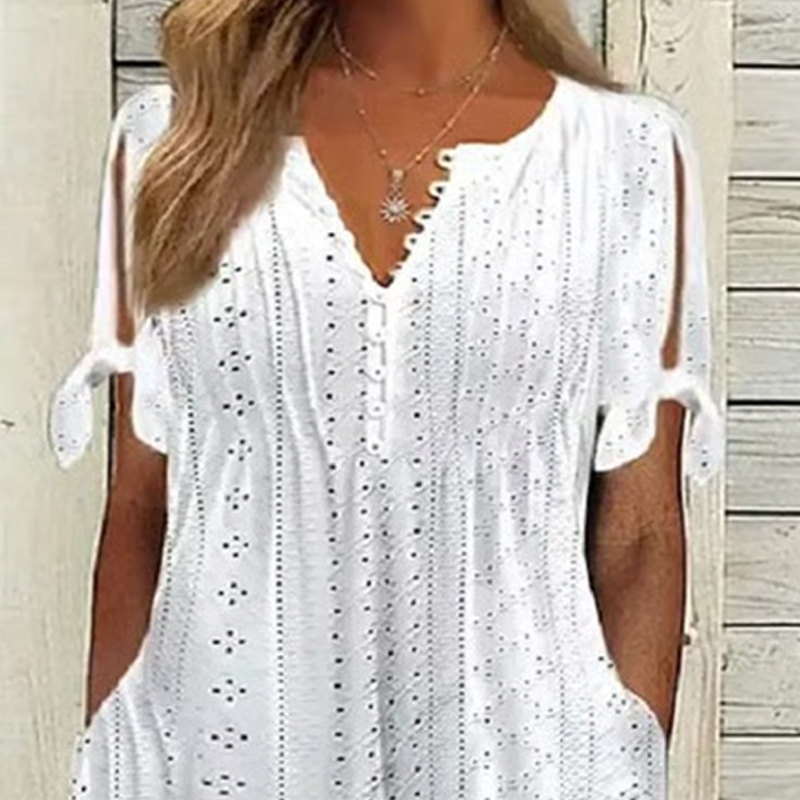 Odette – Vestido midi broderie con cuello en V y mangas anudadas