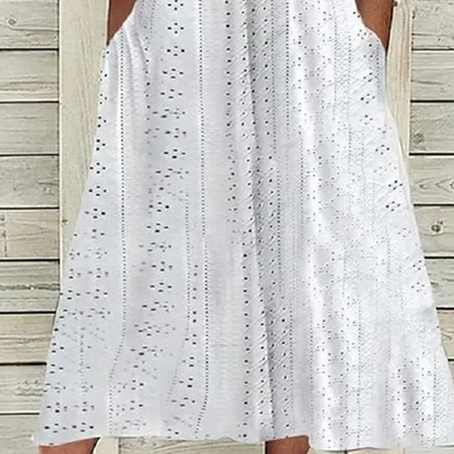 Odette – Vestido midi broderie con cuello en V y mangas anudadas