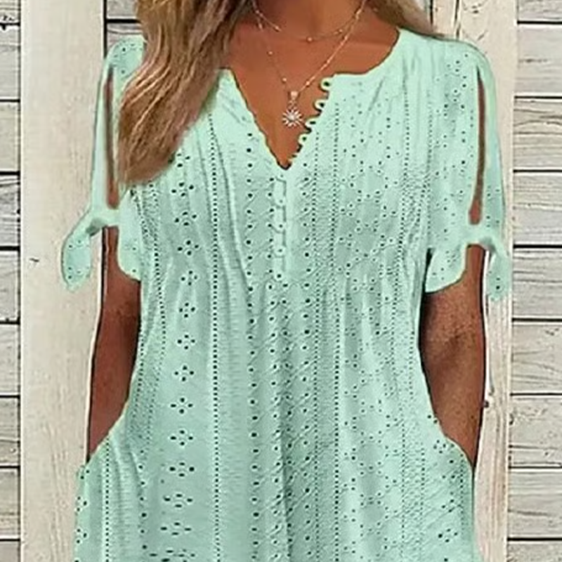 Odette – Vestido midi broderie con cuello en V y mangas anudadas