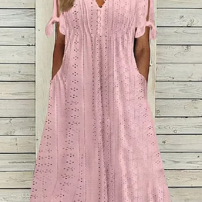 Odette – Vestido midi broderie con cuello en V y mangas anudadas