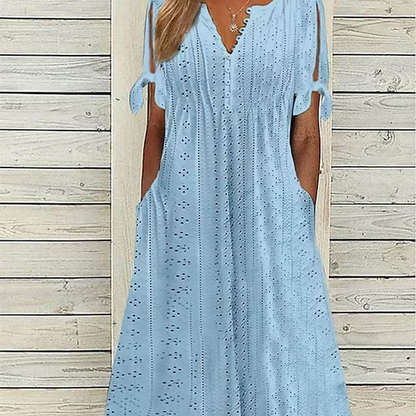 Odette – Vestido midi broderie con cuello en V y mangas anudadas